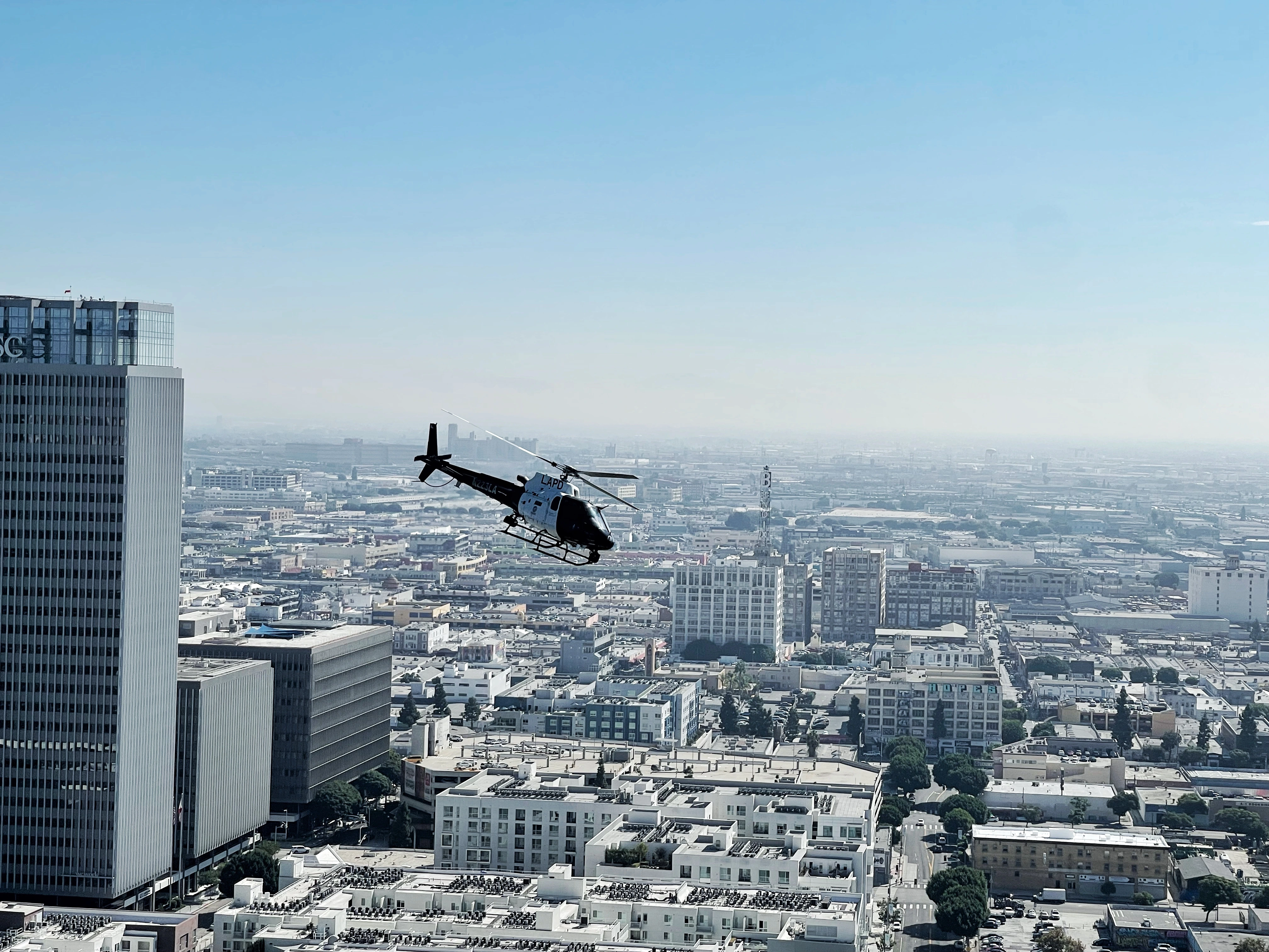 Helicopter over cityscape